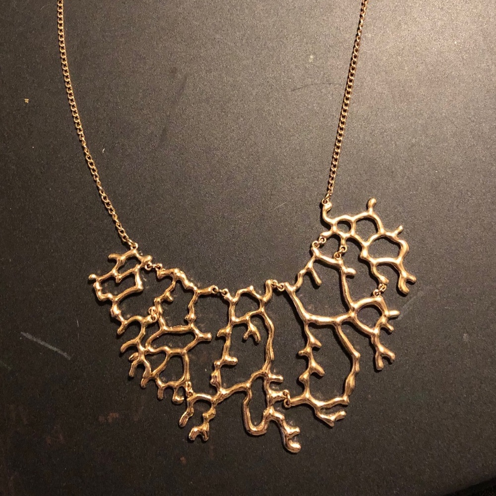 Gold necklace with fun design